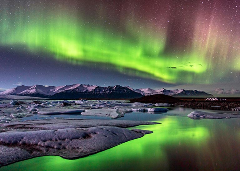homepage-science-card science techbook view of bright green aurora borealis
